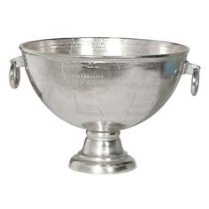 a silver bowl with two handles is shown