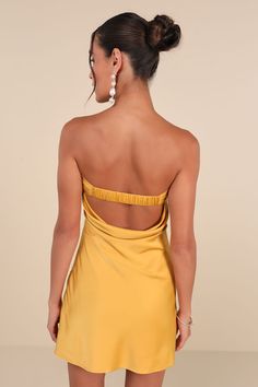 Get ready to arrive on the scene and cause a commotion in the Lulus Exquisite Approach Marigold Satin Strapless Cowl Back Mini Dress! Sleek satin shapes this flirty dress that features a straight, foldover neckline (with hidden no-slip strips) and a strapless, darted bodice. The flattering slip-style silhouette falls to a sexy mini hem, while an elasticized strap sits above a trendy cowl back. Hidden zipper/clasp at side. Fit: This garment fits true to size. Length: Mid-thigh. Size medium measur Strapless Yellow Mini Dress For Night Out, Yellow Strapless Mini Dress, Chic Yellow Mini Strapless Dress, Fitted Mustard Sleeveless Mini Dress, Elegant Yellow Strapless Mini Dress, Fall Wedding Outfits, Fall Wedding Guest, Perfect Little Black Dress, Fall Wedding Guest Dress