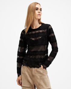 Get into lace this season. The Tiff Top features a mix of lace panels placed across the body with sheer elements on show. Shaped to an easy silhouette with a round neck and long sleeves - we think it's perfect for date night dressing. Pair with tailored pants or a denim skirt - it's simple styling with maximum impact.   This top is designed to a slim fit, we suggest sizing up for a looser fit. Button closure Round neck Long sleeve Textured mix of lace and sheer panels Keyhole button fastening at the back of the neck Lightweight Allsaints Long Sleeve Tops For Spring, Fall Lace Top For Layering, Sheer Lace Top For Layering, Chic Lace Crew Neck Top For Fall, Chic Crew Neck Lace Top For Fall, Lace Top For Layering, Crew Neck Lace Top With Lace Sleeves For Fall, Fall Lace Top With Patchwork For Layering, Fall Crew Neck Lace Top With Lace Sleeves