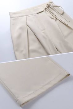 Reinvent your wardrobe with these of-the-moment High-waisted Loose Straight Wide-leg Trousers. Crafted from lightweight fabric, they provide a flattering fit with a comfortable wide-leg silhouette. These trousers are sure to be your new go-to for a modern look with a touch of sophistication! Discover streamlined sophistication with these Simulated Silk Satin Draped Ice Silk Wide-Leg Trousers. Crafted from premium ice silk fabric, they provide a smooth, lightweight fit with a striking draped silh Summer Pants With Pockets In Elastane, White Fitted Belted Bottoms, Elegant Summer Wide Leg Elastane Pants, Chic Beige Elastane Pants, High-waisted Elastane Wide Leg Pants For Summer, Solid Color Ankle-length Office Bottoms, White Belted High-waisted Pants, Tailored Elastane Pants For Summer, Ankle-length Elastane Dress Pants For Summer