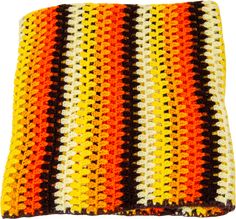 an orange, yellow and black crocheted dishcloth