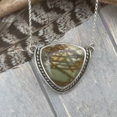 "Beautiful cherry creek jasper stone in shades of green set in sterling and fine silver with attached chain.   Pendant measures 1 1/4\" wide x 1 1/8\" long, necklace measures approximately 19\" total." Cherry Creek Jasper, Jasper Ring, Bone Pendant, Royston Turquoise, Silver Work, Jasper Pendant, Jasper Stone, Chain Pendant, Turquoise Sterling Silver