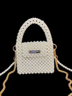 Explore our exquisite collection of handmade bags, featuring unique designs perfect for any occasion. Elevate your style with our elegant Women's Bag, ideal for weddings and special events. Our White Pearl Handbag is a luxurious accessory that adds a touch of sophistication to your ensemble. Whether you're a bride looking for the perfect bag or searching for a Valentine's Day gift, our range of trendy and carefully crafted bags ensures you stand out at any evening party. Embrace the allure of ou Trendy Handheld Box Bag Gift, Trendy Handheld Evening Bag As Gift, Pearl Handle Tote Bag For Gift, Gift Tote Bag With Pearl Handle, Portable Top Handle Shoulder Bag For Gift, Luxury Tote Shoulder Bag With Pearl Handle, Chic Handheld Bag For Gift, Trendy Shoulder Bag With Pearl Handle As Gift, Chic Handheld Shoulder Bag As Gift