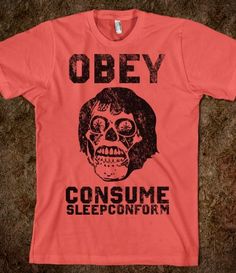 an orange shirt that says obey consume sleepconfortm on it, with a skull in the middle