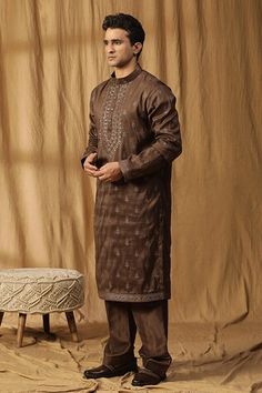 Brown kurta with bead embroidery. Paired with a salwar. - Aza Fashions Traditional Fit Straight Kurta With Dabka Work, Traditional Fit Salwar Kameez For Eid, Traditional Fit Designer Kurta For Eid, Designer Traditional Fit Kurta For Eid, Embroidered Chanderi Fabric For Straight Kurta With Dabka, Designer Wear Embroidered Straight Kurta For Eid, Eid Traditional Wear Straight Kurta With Resham Embroidery, Traditional Embroidered Fabric For Straight Kurta With Dabka, Eid Embroidered Straight Kurta Fabric