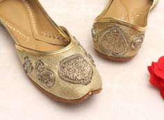 * Bridal wedding gold heart flat shoes as shown above. * comfortable in wear. * Perfect for every occasion. * best in quality. * Handmade by me. Please chose your size from the below chat. If you are not sure about your size, please let us know.We ll help you out. Sizes: - US 4.5 - EU 34 - 22.5 cms - US 5 - EU 35- 23cms - US 6 - EU 36- 23.5 cms - US 7- EU 37- 24 cms - US 7.5- EU 38- 24.5 cms - US 8.5- EU 39- 25 cms - US 9- EU 40- 25.5 cms - US 10- EU 41- 26 cms - US 11- EU 42- 26.5 cms ** Standa Gold Flat Wedding Shoes For Party, Gold Embroidered Wedding Shoes, Gold Round Toe Flats For Wedding, Wedding Flats With Gota Work And Round Toe, Gold Flat Heel Wedding Shoes, Gold Round Toe Flats For Party, Wedding Shoes With Gold Embroidery, Gold Flats With Round Toe For Party, Gold Flat Wedding Shoes For Formal Occasion