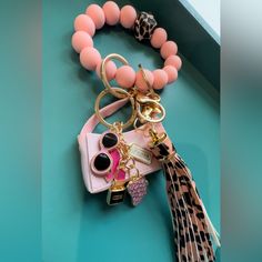 Very Cute Fashion Keychain. Beaded Wrist Bracelet With Pink And Cheetah Tassle. Pink Purse That Opens & Closes And A Cute Sunglasses Lip/ Lipstick Lock Charm. Beaded Wristlet Fashion Accessory, Meaning Of Candy Cane, Fashion Keychain, Paw Keychain, Keychain Beaded, Lip Lipstick, Monogram Hearts, Coach Keychain, Monogram Keychain