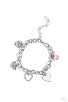 A textured silver heart silhouette, sleek silver heart, sunburst-detailed silver heart, pink-painted heart, and baby pink pearl heart dangle along a silver chain for a romantic declaration. Features an adjustable clasp closure around the wrist. Sold as one individual bracelet. Pink Adjustable Chain Bracelet, Trendy Metal Heart Charm Bracelet, Trendy Silver Charm Bracelet With Heart Beads, Trendy Silver Chain Heart Jewelry, Adjustable Chain Heart Bracelet, Adjustable Heart Chain Bracelet, Dainty Silver Heart Chain Bracelet, Sterling Silver Heart Bracelet With Adjustable Chain, Silver Heart-shaped Chain Bracelet