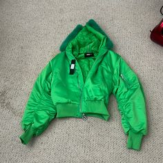 Nova Men Jacket Never Worn Spring Puffer Outerwear For Streetwear, Spring Streetwear Puffer Outerwear, Spring Streetwear Outerwear With Padded Collar, Spring Streetwear Puffer Windbreaker, Green Windbreaker For Fall Cold Weather, Green Parka For Spring Streetwear, Green Windbreaker For Cold Weather In Fall, Green Windbreaker For Winter Cold Weather, Hooded Utility Outerwear With Padded Collar