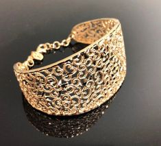 "Artisan design 14k solid yellow gold Lace design bracelet--gorgeous and unique, exclusive to my store. Unique jewels that express the love and the connection between two people... White gold bracelet; https://etsy.me/2FuE2lQ Description: ✤ This bracelet is made to order ✤ This bracelet is handmade from start to finish in Our workshop, DaninoDesigner. ✤ Made Of 14K Yellow Gold. ✤ Bracelet width: 1.38'' / 3.5cm ✤ Approx gold weight 22.80 grams. ✤ PACKAGING: Every order is shipped with our luxury Gold Filigree Bracelet, Solid Gold Bangle, Victorian Bracelet, Wedding Jewelry For Bride, Filigree Bracelet, Lace Bracelet, Geometric Bracelet, Arm Bracelets, Modern Bracelets