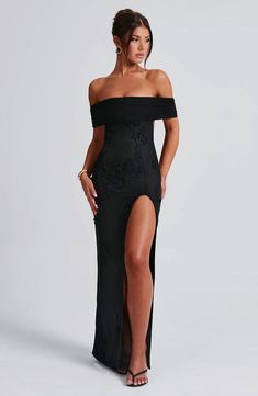 Milani is one of our dreamiest designs of the season, perfect for chasing sunsets and beyond. This maxi dress is soft girl perfection, made in a delicate mesh with playful 3D flower appliques and bardot neckline to show off your shoulders. The dress is complete with a thigh high split and open low back. 



Colour: Black.

Premium stretch mesh.

Fully lined.

3D floral appliques.

Bardot neckline.

Strap detail at back.

Cut out low back.

Thigh high split.

Invisible zip fastening.

Maxi length Homecoming Dresses Corset, White Dress Spring, Midi Dress Wedding Guest, Long Sleeve Homecoming Dresses, Chasing Sunsets, Split Long Dress, Bardot Neckline, Homecoming Dresses Long, Maxi Dress Sale