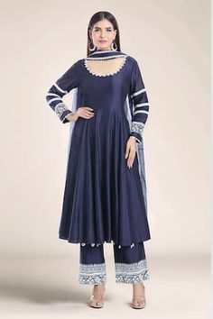 Navy blue chanderi anarkali with contrasting embroidery detailing on the neckline and sleeves. Comes with an intricate embroidered pant and embroidered organza dupatta. - Aza Fashions Long Sleeve Anarkali Set With Embroidered Border For Navratri, Bollywood Style Long Sleeve Anarkali Set With Embroidered Border, Blue Anarkali Set With Embroidered Border, Festive Blue Dress With Embroidered Border, Elegant Anarkali Set With Embroidered Border For Transitional Season, Fitted Blue Anarkali Set With Embroidered Border, Designer Blue Dresses With Embroidered Border, Elegant Long Sleeve Anarkali Set With Embroidered Border, Blue Dresses With Embroidered Border For Festive Occasions