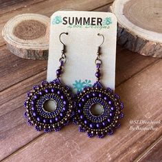 Pearl earrings beaded boho brick stitch round purple Native handmade earrings bronze boho style hippie beaded faux circle jewelry for women These beauties remind me of my grandmother, mother. They adored pearls. Faux or not, they always had a pair on hand for something fancy. Brick stitch beaded earrings in 15/0 seed beads of purple's and bronze, 5mm faux purple pearl beads, bronze ear wires. Handmade beaded on durable fire line. Length: 2 inches approx Brick stitch is an old and revered art. A Bohemian Wire Wrapped Beaded Earrings, Bohemian Purple Hoop Earrings With Round Beads, Nickel-free Purple Beaded Round Earrings, Bohemian Circle Beaded Earrings Nickel Free, Handmade Purple Beaded Round Earrings, Purple Bohemian Round Hoop Earrings, Bohemian Purple Round Hoop Earrings, Bohemian Beaded Circle Earrings, Bohemian Circle Beaded Earrings