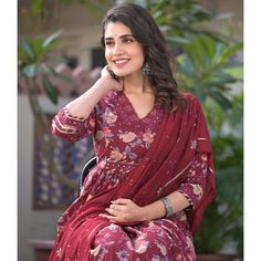 Maroon colored suit is prettified with floral printed work as shown which makes it appear classy. This top is made of pure cotton fabric which is accompanied with pure cotton bottom and chanderi dupatta. Women can buy this suit to wear for their parties and functions. Note:- The actual product may differ slightly in color and design from the one illustrated in the images when compared with computer or mobile screen. Size Chart Size: Semi Stitched/Unstitched can be altered from maximum to minimum Designer Anarkali Salwar Kameez With Floral Print, Semi-stitched Chanderi Palazzo Set With Floral Print, Chanderi Palazzo Set With Floral Print And Straight Kurta, Designer Cotton Sharara With Floral Print, Bollywood Style Floral Chanderi Sharara, Designer Lawn Suit With Floral Print For Navratri, Unstitched Chanderi Kurta With Floral Print, Unstitched Floral Anarkali Set, Unstitched Floral Print Palazzo Set For Navratri