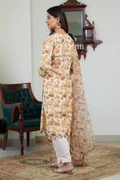 Cream pure chanderi kurta with yellow and pink floral digital print. Comes with dyed pant and a pure organza dupatta with magzi and dori patti hand embroidery. - Aza Fashions Yellow Anarkali Unstitched Suit With Naqshi Detail, Anarkali Unstitched Yellow Suit With Naqshi Details, Yellow Chanderi Palazzo Set With Printed Motifs, Yellow Mulmul Palazzo Set With Dabka Work, Unstitched Yellow Mulmul Sharara, Yellow Palazzo Set With Dabka Work In Mulmul, Yellow Unstitched Mulmul Sharara, Yellow Mulmul Sharara With Dabka Work, Yellow Sharara With Dabka Work In Mulmul