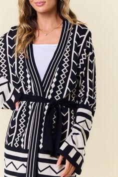 Upgrade your wardrobe with the Isabel Aztec Placement Cardigan! This stunning piece features a unique Aztec design, adding a touch of bohemian flair to your style. It's perfect for layering during chilly weather, keeping you warm and stylish all day long. Embrace your inner fashionista with this must-have cardigan! Aztec Print Cardigan Outfit, Oversized Aztec Sweater, Aztec Hoodie, Aztec Sweater, Aztec Print Cardigan, Rompers For Kids, Aztec Design, Plus Size Romper, Aztec Designs