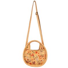 OOTD… sundresses or jeans? How we love this bag styled in every way! Wear this circle bag cute, in-hand, in the crook of your elbow or hands-free with the adjustable cross-body strap. Artisan-crafted leather knots + muti-colored floral embroidery make Aster- oh so groovy + the epitome of 1960’s cool casualness. See Meadow large and Meadow small for other options. Details 100% Full-Grain Leather Handcrafted in small batches by skilled artisans in South America and India—never mass-produced. Each Summer Handheld Hobo Bag With Leather Handles, Spring Leather Hobo Bag With Adjustable Strap, Leather Hobo Bag With Adjustable Strap For Spring, Summer Leather Hobo Bag With Detachable Handle, Spring Shoulder Bag With Round Handle, Leather Crossbody Hobo Bag For Spring, Leather Hobo Crossbody Bag For Spring, Spring Leather Bag With Bamboo Handle, Spring Leather Hobo Bag With Detachable Strap