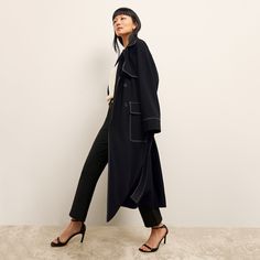 The Frankie jacket is the main character in any room it walks into. It features classic trench-inspired details—including wide lapels, a storm flap, patch pockets, and a waist-defining belt—and stands out thanks to contrast top stitching. Our mid-weight Everyday Crepe fabric makes it gorgeously drapey, easy-care, and ideal for travel. ﻿Made in Vietnam with fabric from Japan. Luxury Wool Coat With Button Cuffs For Work, Designer Long Coat With Double Button Closure, Luxury Wool Coat With Pockets For Fall, Gabardine Wool Coat With Lapel Collar For Work, Designer Double-breasted Wool Coat For Work, Designer Outerwear With Belted Cuffs, Luxury Double-breasted Outerwear With Button Cuffs, Chic Pea Coat With Lapel Collar For Work, Chic Outerwear With Suit Collar And Pockets