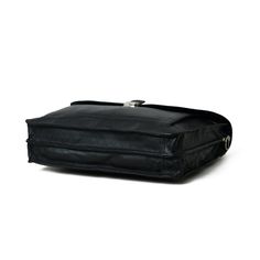 Our Sleek Black Attache Laptop Bag combines style with functionality. Crafted from robust buffalo leather, it exudes durability and sophistication. The metal clasp closure ensures secure storage, while the canvas lining adds sturdiness. There's a large main compartment along with other small compartments for keeping your belongings organized. With ample space, it comfortably accommodates a laptop, books, and files, making it perfect for office meetings or offsite outings. Elevate your profession Classic Leather Saddle Bag With Silver-tone Hardware, Classic Black Saddle Bag With Palladium Hardware, Travel Briefcase With Silver-tone Hardware, Travel Briefcase With Silver-tone Hardware And Top Handle, Satchel Box Bag With Palladium Hardware For Everyday Use, Everyday Satchel Box Bag With Palladium Hardware, Leather Bags With Silver-tone Hardware For Daily Use, Timeless Flap Bag With Palladium Hardware For Everyday Use, Classic Saddle Bag With Silver-tone Hardware For Everyday