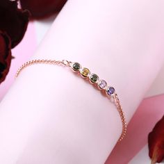 The bracelet can choose 1-12 gems, each gem can choose 12 months, each gem represents a child or a loved one. This birthstone bracelet is exquisite and elegant. It is a loving gift for mom, wife, sister or any other special lady in your life. Those who receive this bracelet can reap full of happiness and love. Mother's Day Cubic Zirconia Bracelets, Round Gemstone Crystal Bracelet Gift, Round Crystal Gemstone Bracelet Gift, Gemstone Crystal Bracelet As Gift, Mother's Day Gift Crystal Round Bracelet, Mother's Day Gift Crystal Bracelet, Mother's Day Gift Round Crystal Bracelet, Crystal Bracelet With Stones As A Gift, Personalized Cubic Zirconia Bracelets