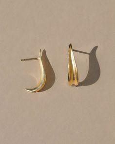 A truly stunning unique earrings that perfectly pair everyday casual outfits through to special occasions and nights out, named for Morro Bay - a small special California town. Gold Vermeil (14k gold over sterling silver) made with recycled materials Includes silicone earring backs which we’ve found to be most comfortable and secure and best suited to this style of earring.CARE: Most metals will naturally patina over time, however, there are measures you can take to prolong the life of your jewe Minimalist Gold-toned Sterling Silver Earrings, Gold Minimalist Sterling Silver Earrings, Minimalist Gold Sterling Silver Earrings, Everyday Yellow Gold-plated Earrings, Everyday Yellow Gold Plated Earrings, Elegant Brass Huggie Earrings As Gift, Elegant Brass Huggie Earrings For Gift, Classic Gold Earrings In Recycled Gold, Elegant Gold Hoop Earrings In Recycled Gold