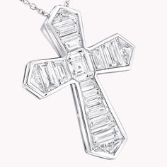 A contemporary interpretation of a classic motif, this Cross pendant in 18 carat white gold is beautifully crafted to showcase the sleek beauty of baguette cut diamonds. Custom cut to fit the design, the diamonds are individually handset by our master artisans to taper in size as they radiate outwards. An elegant Classic Graff cross motif baguette cut diamond pendant with a total weight of approximately 3.06 carats. Heart Shaped Diamond Pendant, Rare Diamonds, Diamond Drop Pendant, Round Diamond Pendant, Diamond Drop Necklace, Rare Diamond, Necklaces Diamond, Diamond Earrings Studs Round, Diamond Pendants