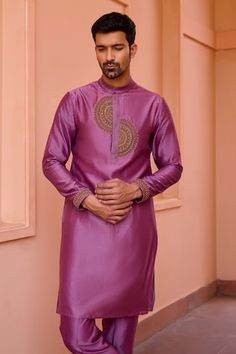 Wine kurta with marodi dori embroidery along the placket. Paired with a pant. - Aza Fashions Art Silk Sherwani With Embroidered Border For Designer Wear, Art Silk Sherwani With Embroidered Border, Designer Art Silk Sherwani With Embroidered Border, Festive Kurta With Embroidered Border And Traditional Fit, Designer Purple Kurta With Embroidered Border, Designer Purple Embroidered Kurta, Transitional Art Silk Sherwani With Embroidered Border, Ceremonial Kurta With Embroidered Border For Diwali, Purple Kurta With Intricate Embroidery And Traditional Drape