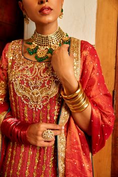 Gold Floor-length Churidar With Zari Work, Red Dabka Lehenga For Reception, Traditional Salwar Kameez With Gota Work For Reception, Gold Floor-length Festive Churidar, Red Traditional Wear With Dabka For Reception, Festive Gold Floor-length Churidar, Red Anarkali Set With Dabka For Reception, Gold Floor-length Choli With Dabka Detail, Traditional Gold Floor-length Salwar Kameez