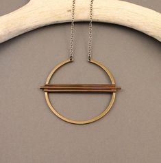 Equinox geometric brass circle necklace with gunmetal chain- modern, minimalist, boho design Modern Brass Jewelry With Oxidized Finish, Modern Oxidized Brass Jewelry, Minimalist Gunmetal Metal Necklace, Minimalist Circle Brass Necklace, Minimalist Geometric Metal Necklace, Modern Hand Forged Brass Necklace, Modern Everyday Brass Necklace, Modern Bronze Metal Necklaces, Modern Bronze Metal Necklace