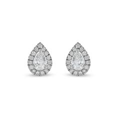 Dainty and dazzling, these diamond stud earrings add a bright punch of shimmer to your wardrobe. Each diamond center stone of pear shape and then lined with a border of round diamonds. Radiant with diamonds and a bright polished shine, these post earrings secure comfortably with friction backs. Classic Pear-shaped White Gold Diamond Earrings, White Gold Diamond-accented Teardrop Earrings For Anniversary, Anniversary Pear-shaped Diamond Earrings With Halo Setting, White Diamond Accented Pear-shaped Teardrop Earrings, Classic Pear-shaped Diamond Earrings With Prong Setting, Teardrop Halo Diamond Earrings, White Diamond-accented Teardrop Earrings, Pear-shaped White Gold Diamond Earrings With Accents, Pear-shaped Diamond Earrings With Accents