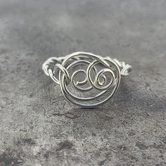 Handmade sterling silver ring, finger size 11.5. Sterling Silver Swirl Jewelry In Silver, Sterling Silver Swirl Jewelry, Adjustable Spiral Silver Midi Rings, Adjustable Spiral Midi Rings In Silver, Adjustable Silver Midi Rings With Modern Twist, Minimalist Spiral Silver Jewelry, Modern Twist Silver Wire Wrapped Jewelry, Adjustable Silver Spiral Midi Rings, Modern Spiral Promise Ring