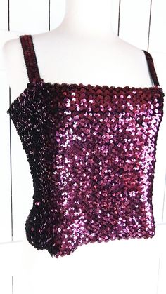 "Vintage sequins stretch tank top/sequin stretchy fitted cropped tube top/medium Measurements... -marked size: medium (fits larger) -across width: 17.5\" unstretched -length: 12\" -strap length: 6.5\" Features... -sequins throughout -great stretch -pullover style -soft black lining -Union made Condition... -excellent vintage condition -gently worn TDD3176*" Fitted Sequined Tank Top For Summer, Evening Sequin Stretch Crop Top, Evening Sequined Stretch Crop Top, Fitted Sleeveless Crop Top With Contrast Sequin, Glamorous Fitted Tank Top For Party Season, Fitted Sleeveless Sequin Fabric For Night Out, Strapless Fitted Crop Top For Party Season, Fitted Strapless Crop Top For Party Season, Stretch Sequined Tank Top