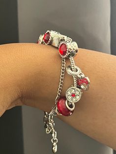 It's boho chic meets clean girl, it is your statement piece and your demure personality all coming together to perfection. This beautiful red charm bracelet will make the perfect gift for any occasion.