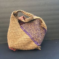 "Handmade macrame shoulder bag.  it's a very spacious big size bag which you can hold in your hand or put on the shoulder.  It measures about about 17\" x 13\"  and the handles are about 19\" long and 1\" wide. The material is jute and it has one compartment." Brown Crochet Hobo Bag For Everyday Use, Brown Hobo Crochet Bag For Everyday, Bohemian Rectangular Hobo Bag For Shopping, Bohemian Weaving Bucket Bag For Everyday Use, Bohemian Bucket Bag With Weaving For Everyday Use, Bohemian Weave Bucket Bag For Everyday Use, Bohemian Woven Hobo Bag For Shopping, Everyday Bucket Shoulder Bag With Weaving, Bohemian Shoulder Bag With Braided Handles For Shopping