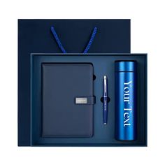 a blue box with a pen and notebook in it