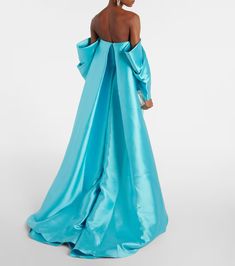 Kyla caped twill and crêpe gown in blue - Solace London | Mytheresa Pre-draped Cape Evening Dress, Evening Blue Maxi Dress With Draped Sleeves, Blue Maxi Dress With Draped Sleeves For Evening, Pre-draped Gown With Cape Sleeves, Long Evening Dress With Draped Sleeves For Gala, Gala Evening Dress With Draped Sleeves, Elegant Blue Maxi Dress With Cape Sleeves, Blue Evening Dress With Draped Sleeves For Formal Events, Blue Maxi Dress With Draped Sleeves For Party