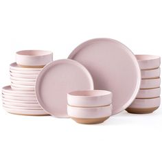 a stack of pink plates and bowls