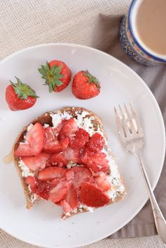 a piece of toast with strawberries on it