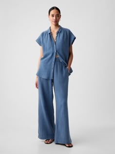 Soft crinkle gauze denim wide-leg, pull-on pants.  Elasticized waist.  Front slant pockets.  * Fit: Loose.  A baggy silhouette throughout.  High rise.  Models wearing Gap Spain Outfit, Gauze Pants, Crinkle Cotton, European Summer Outfits, Pants Blue, Summer Skirts, Wide Leg Denim, Pull On Pants, The Gap