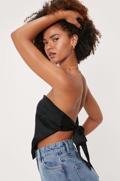 The EMES SHOPtop is detailed with astrapless bandeau neckline. and triangle front hem. Features a completely open back. and tie closure. This cute and effortlessly cool top is perfect for a hot summer day.MATERIAL:80% Soft Poly. 20% Cotton MEASUREMENTS:Small : 4-6 Chest: 33-34.5 in Length: 13.4" in Medium : 6-8 Chest: 34.5-36 in Length: 13.8" in Large : 8-10 Chest: 36-37.5 in Length: 14.2" in Satin Crop Top Diy, Black Satin Top Outfit, Satin Crop Top Outfits, Satin Top Outfit, Blue Satin Top, Femme Fatale Aesthetic, Eatonton Georgia, Triangle Bandana, Black Satin Top