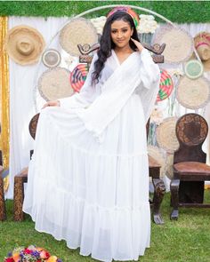 Adorable White chiffon. Scarf is included . #  Please leave your phone number for delivery purposes. Traditional White Chiffon Dress, White Long Chiffon Dress, Bohemian White Chiffon Dress, White Maxi Dress For Traditional Ceremonies, Long White Chiffon Dress, Chiffon Habesha Dress, Simple Habesha Kemis, White Maxi Dress For Summer Traditional Ceremonies, Traditional White Dress With Ruffles