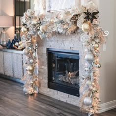 a living room with a fireplace decorated for christmas