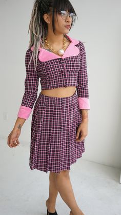 Every cutie needs our Plaid Portrait Collar Jacket with Pleated Skirt Matching Set. Perfect professional look when you need to make a statement. With the pleated skirt and princess pink contrast colors, you are bound to stand out in the crowd. Put your unique self on display and be ready to get tons of compliments at your fashionable interview. The crop jacket is fully lined in a soft charmeuse, paired with a pleated skirt with a side invisible zipper. This cute & unique wool suit set is perfect Pink Accordion Pleats Skirt, Fitted Pink Pleated Mini Skirt, Pink Fitted Pleated Skirt With Lining, Pink Fitted Pleated Skirt For Party, Fitted Pink Pleated Skirt With Lining, Fitted Pink Pleated Skirt, Fitted Pink Pleated Skirt With Lined Detail, Fitted Pink Pleated Lined Skirt, Fitted Pink Pleated Skirt For Party