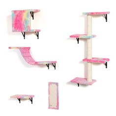 three shelves with different designs on them and one shelf is painted pink, the other has blue