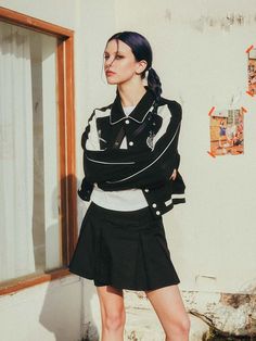 This is varsity jacket that has a feminine and sporty look. With cropped length, pocket details, and ribbed cuff and hem, it is versatile and comfortable to wear daily for a casual outfit. - Color piping detail on the collar- High quality embroidery on the chest- Ribbed cuff and hem- Cropped silhouette Spring Varsity Jacket With Ribbed Collar For Streetwear, Casual Varsity Jacket With Ribbed Cuffs For Spring, Casual Outerwear With Ribbed Cuffs For Campus, Trendy Long Sleeve Cropped Jacket With Ribbed Cuffs, Casual Spring Outerwear With Striped Cuffs, Spring Long Sleeve Varsity Jacket For Campus, Cropped Long Sleeve Jacket With Ribbed Cuffs For Spring, Spring Campus Outerwear With Long Sleeves, Spring Cropped Jacket With Ribbed Cuffs And Long Sleeves