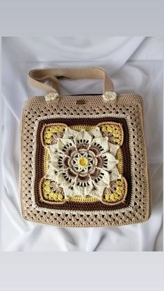 You can buy this bag from my store on Etsy. Handmade Beige Square Crochet Bag, Cream Rectangular Crochet Bag, Handmade Square Beige Crochet Bag, Cream Crochet Square Shoulder Bag, Square Cream Crochet Shoulder Bag, Handmade Beige Crochet Shoulder Bag, Cream Crochet Square Bag, Handmade Brown Square Crochet Bag, Handmade Square Brown Crochet Bag