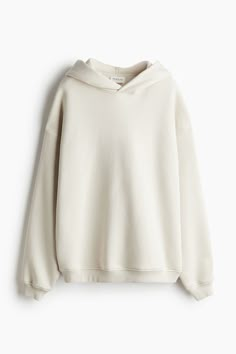 Oversized sports sweatshirt hoodie with a soft  brushed inside. Lined hood with wrapover front  heavily dropped shoulders  long sleeves  and ribbing at cuffs and hem. Oversized Beige Long Sleeve Hoodie, H&m Sporty Winter Hoodie, H&m Sporty Hoodie Sweatshirt, H&m Sporty Long Sleeve Hoodie, H&m Sporty Cotton Sweatshirt, H&m Hoodie, Beige Hoodie, Sports Sweatshirt, Women Activities