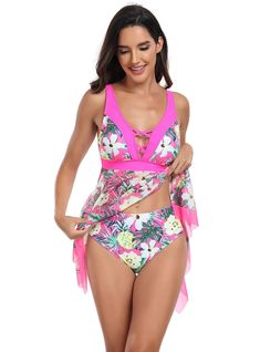 Quintessentially tropical, this swimdress is an ode to the lush vibrancy of a blooming paradise. The hot pink bodice, featuring a plunging neckline with crisscross detailing, offers both support and a daring touch. It cinches just under the bust, highlighting the waist before flowing into a handkerchief-hem skirt adorned with a vivacious floral and pineapple print. The cut provides a flattering drape that enhances movement and grace. This swimdress is crafted from a stretch-resistant, quick-dry Tropical V-neck Tankini For Summer, V-neck Beachwear Swimwear For Summer Parties, Fitted V-neck Tropical Tankini, Tropical V-neck Swimwear With Tropical Print, V-neck Tropical Print Swimwear For Summer, V-neck Swim Dress For Vacation, V-neck Tropical Print Swimwear For Vacation, Pink Sleeveless Swimwear For The Pool, Summer V-neck Tankini Beachwear