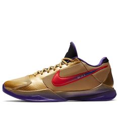 the nike zoom basketball shoe in metallic gold and purple is featured on a white background