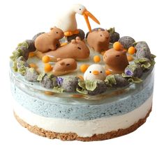 there is a cake decorated with animals on it